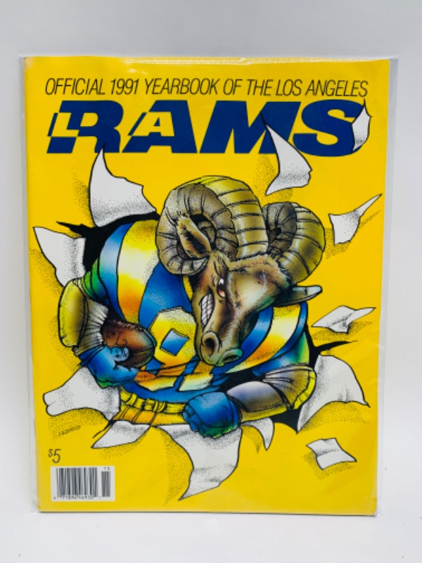 Photo 1 of 279000… official 1991 Los Angeles Rams yearbook in plastic sleeve 
