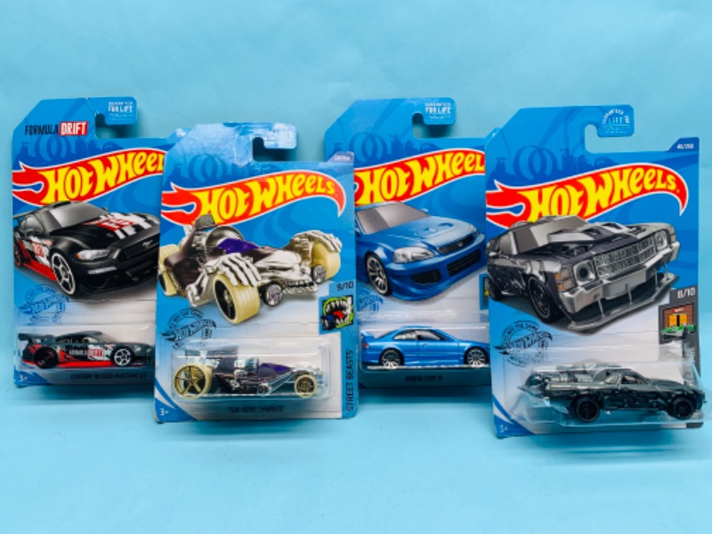 Photo 1 of 279018…4 hot wheels die cast cars in original packages 
