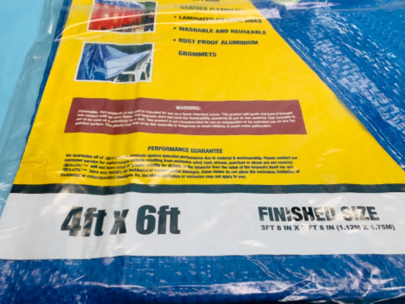 Photo 1 of 279023…two 4x6 foot tarps in packages 