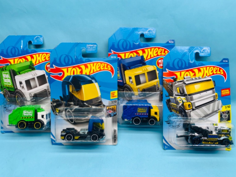 Photo 1 of 279025…4 hot wheels die cast trucks in original packages 