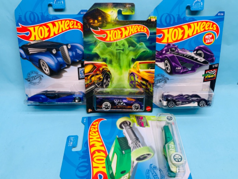 Photo 1 of 279027…4 hot wheels die cast cars in original packages 