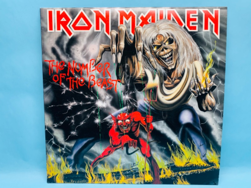 Photo 1 of 279040…great condition Iron Maiden vinyl 1982 record in plastic sleeve cover and record in great condition for age 