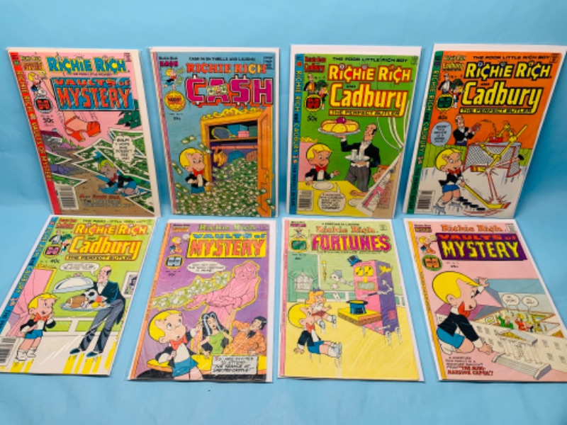 Photo 1 of 279052… 8 vintage Richie Rich comics in plastic sleeves