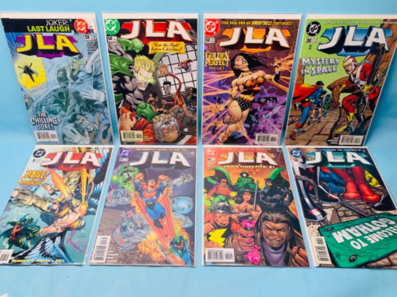 Photo 1 of 279060…8 JLA comics in plastic sleeves 