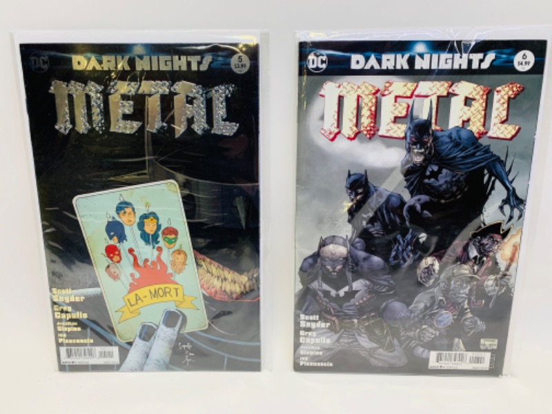 Photo 1 of 279126…2 metal comics in plastic sleeves 