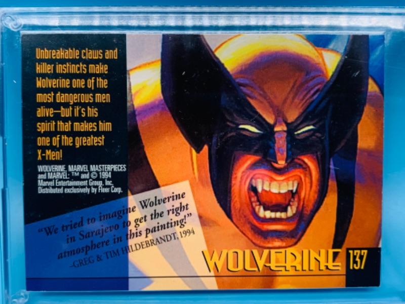 Photo 2 of 279270… Marvel masterpieces wolverine gold foil signature series card 137 in hard plastic case