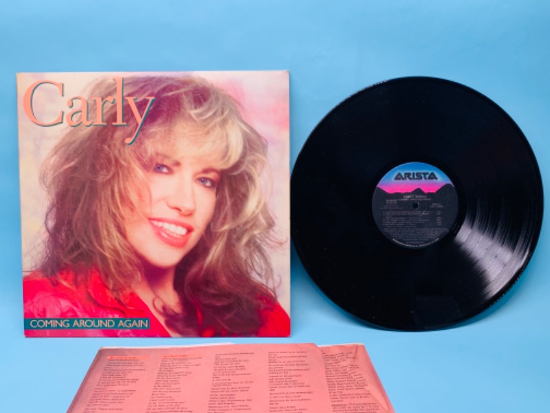 Photo 1 of 279379…great condition Carly Simon vinyl record in plastic sleeve cover and record in great condition for age 