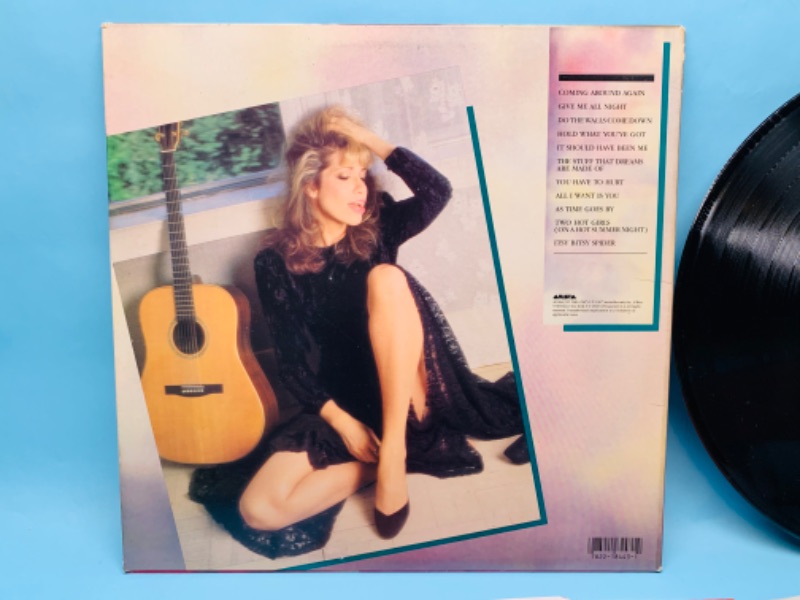 Photo 2 of 279379…great condition Carly Simon vinyl record in plastic sleeve cover and record in great condition for age 