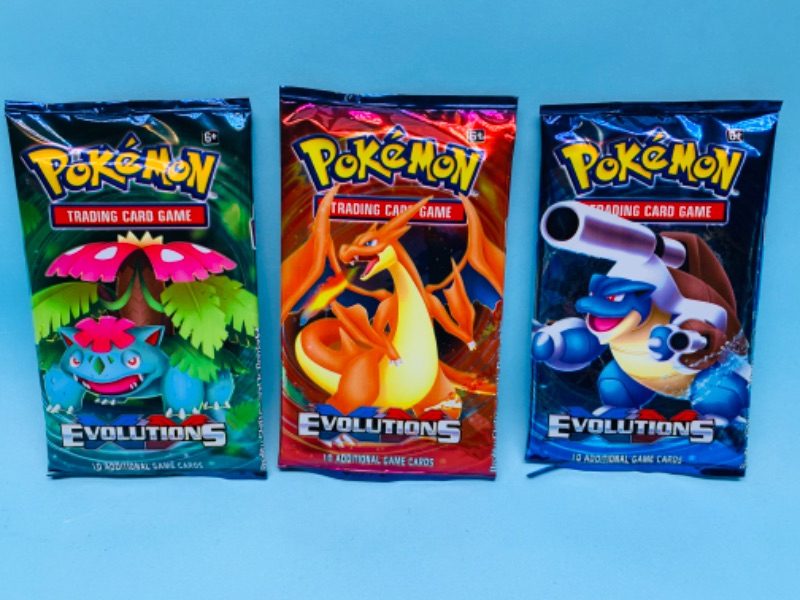 Photo 1 of 279404…3 sealed Pokémon evolutions game cards in packages 