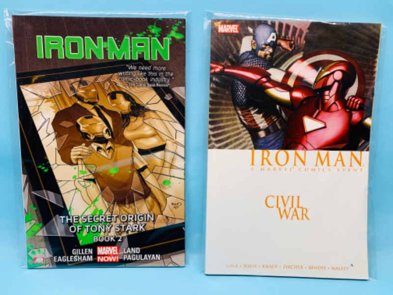 Photo 1 of 279419…2 Iron Man paperback novels in plastic sleeves