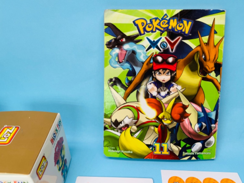 Photo 3 of 279489…Pokémon book, game pieces, and block fun Toys 