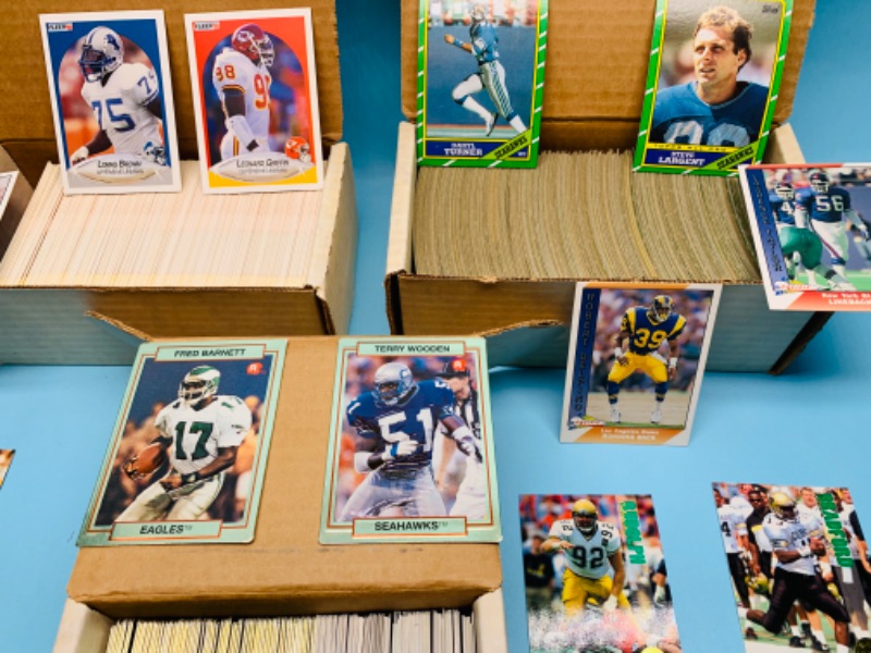 Photo 2 of 279536…mixed football trading cards in boxes 