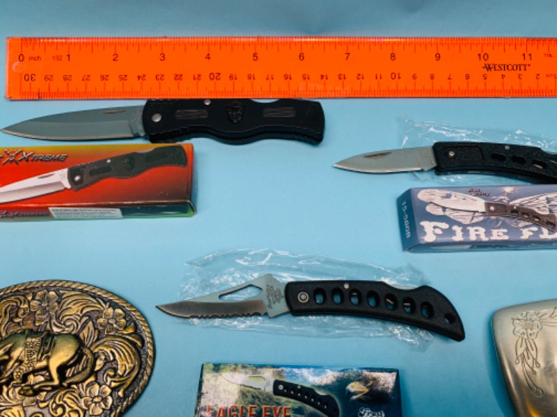 Photo 1 of 279683…3 new folding knives and 2 belt buckles 