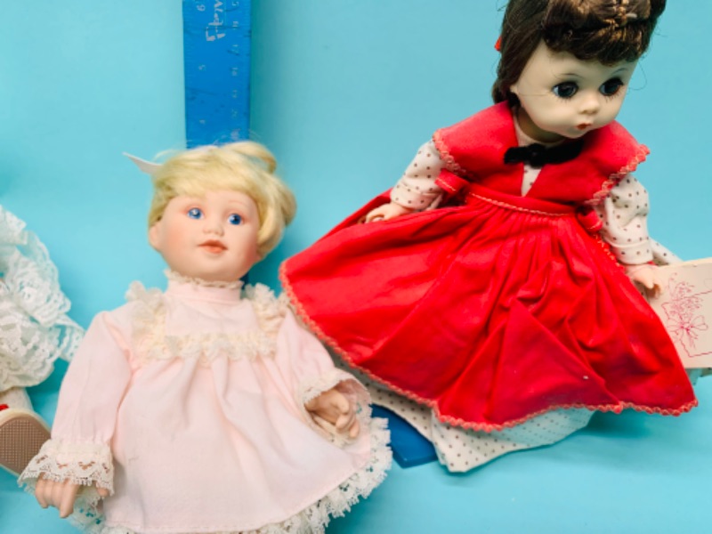 Photo 2 of 279713…vintage porcelain dolls. One is wind up and one is madame Alexander 