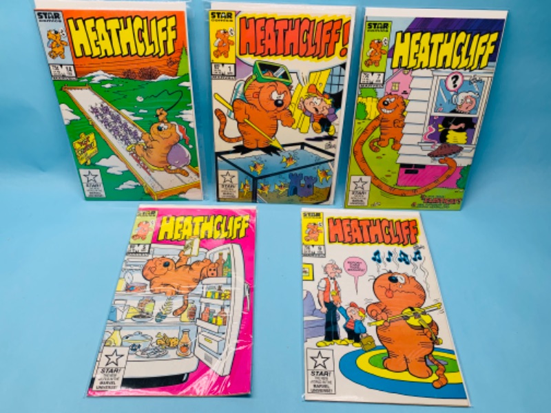 Photo 1 of 279758…5 vintage heathcliff comics in plastic sleeves
