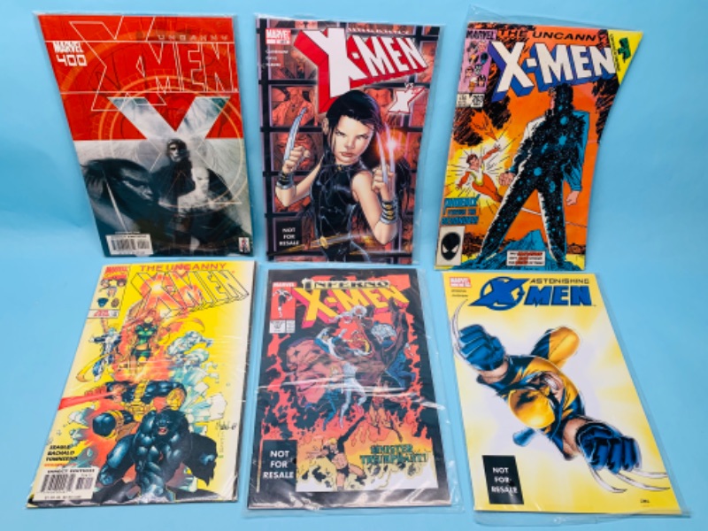 Photo 1 of 279761…6 X-men comics in plastic sleeves 