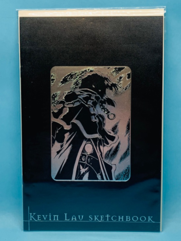 Photo 1 of 279790…Kevin Lav sketchbook comic silver foil leather edition in plastic sleeve 