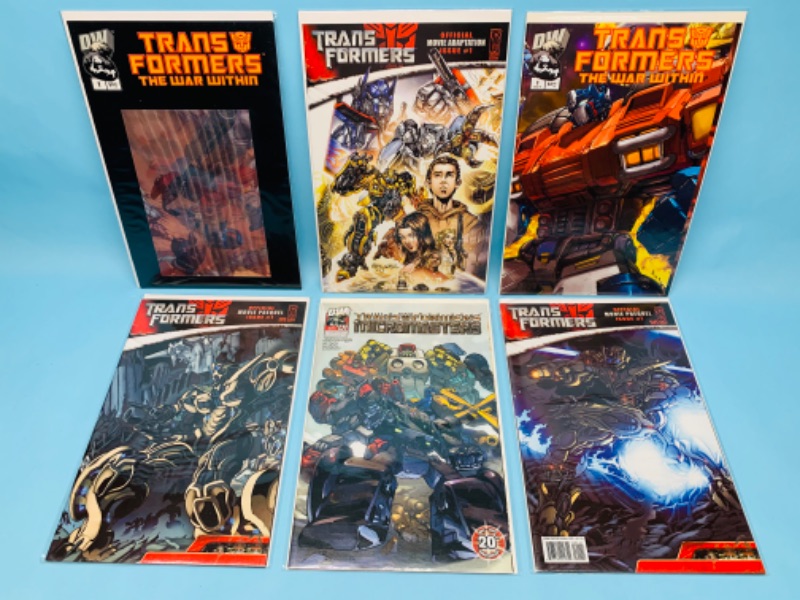 Photo 1 of 279791…6 Transformers number one comics in plastic sleeves