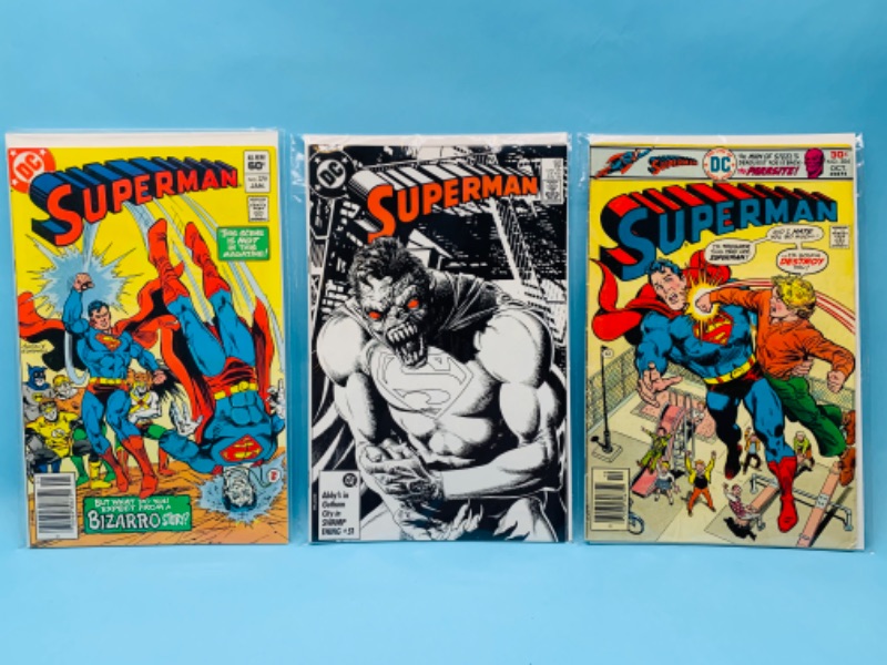Photo 1 of 279818…3 vintage Superman comics in plastic sleeves 