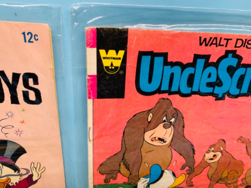 Photo 2 of 279833…shows wear- vintage comics $.12-$.50 cents in sleeves - see photos 