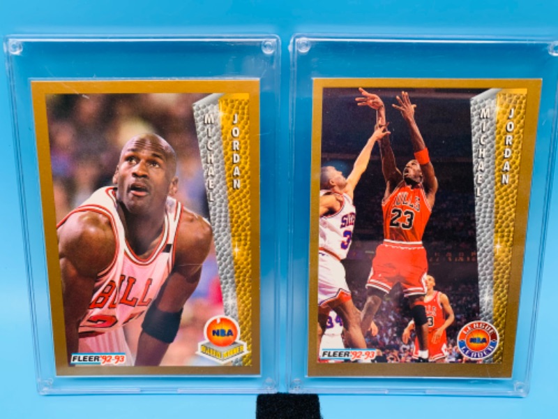 Photo 1 of 279842…two Fleer Michael Jordan cards 238 and 246 in hard plastic cases