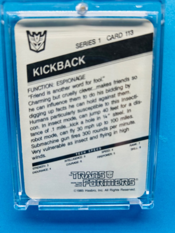 Photo 2 of 279936…rare purple variant vintage 1985 transformers Kickback card 113 series 1 in hard plastic case 