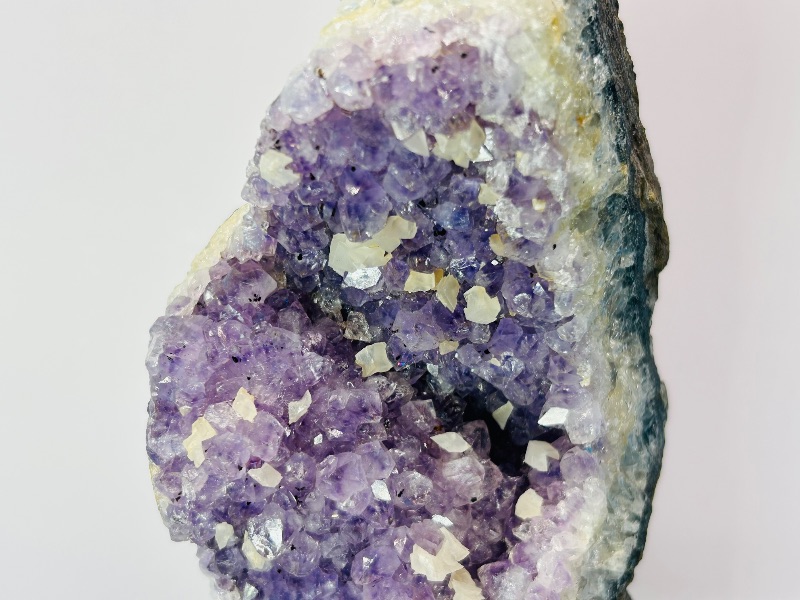 Photo 1 of 279975…8” amethyst crystal rock on display stand-height includes stand