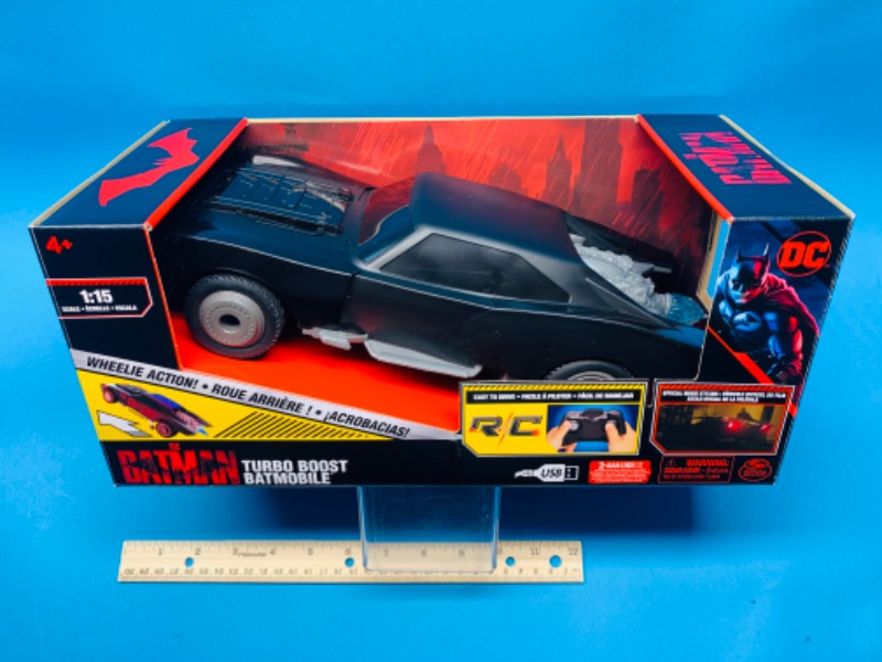 Photo 1 of 281522… the Batman remote control turbo boost batmobile- engine lights up, wheelie action, usb in original box 