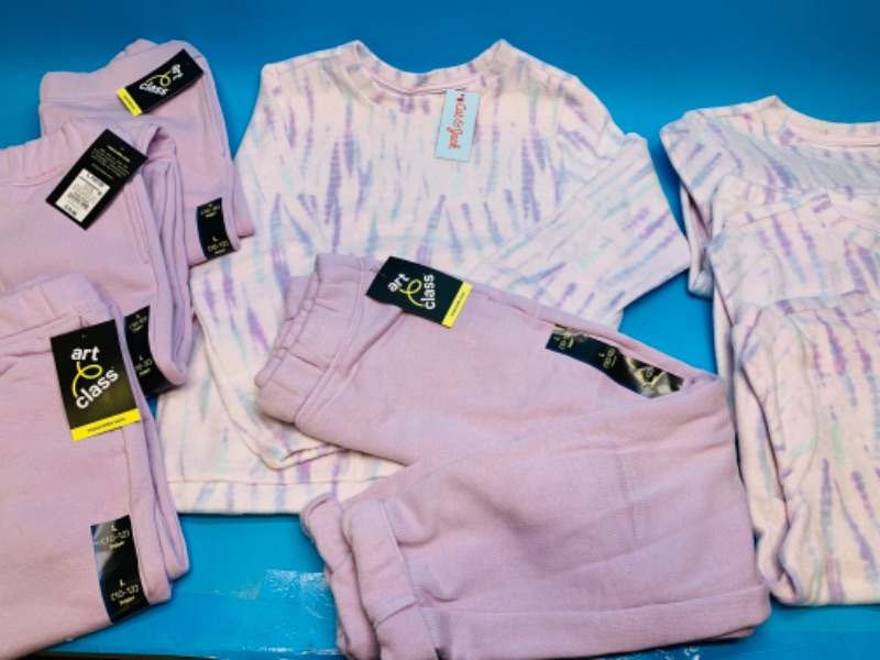Photo 4 of 281558…4 long sleeve shirts with 4 jogger sweats girls size large 10-12 violet/pink  with tags $15.00 x 4=60 $12 x 4 = 48.00