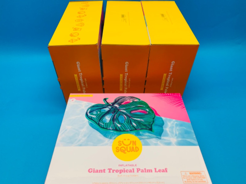 Photo 2 of 281602…  4 sun squad giant inflatable tropical palm leaf pool floats in boxes. Over 5 foot with cup holders. Msrp $25.00 ea x 4