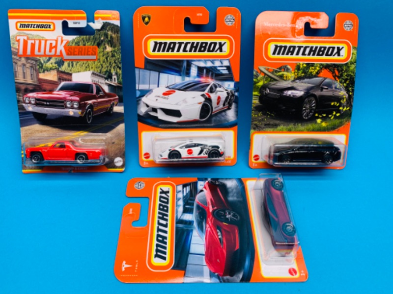 Photo 1 of 281735…4 matchbox die cast cars in original packages 