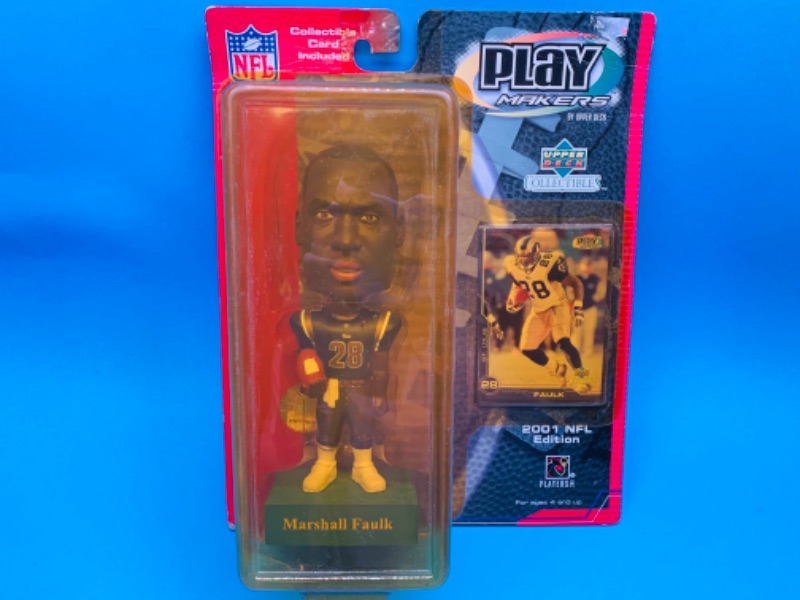 Photo 1 of 282328…upper deck Marshall Faulk bobble head figure and card-yellowing plastic due to age 