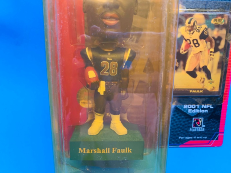 Photo 2 of 282328…upper deck Marshall Faulk bobble head figure and card-yellowing plastic due to age 