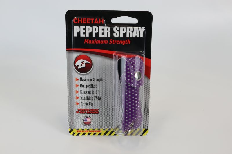 Photo 1 of CHEETAH BRAND PEPPER SPRAY WITH PURPLE SPARKLE CARRYING CASE MAXIMUM STRENGTH 