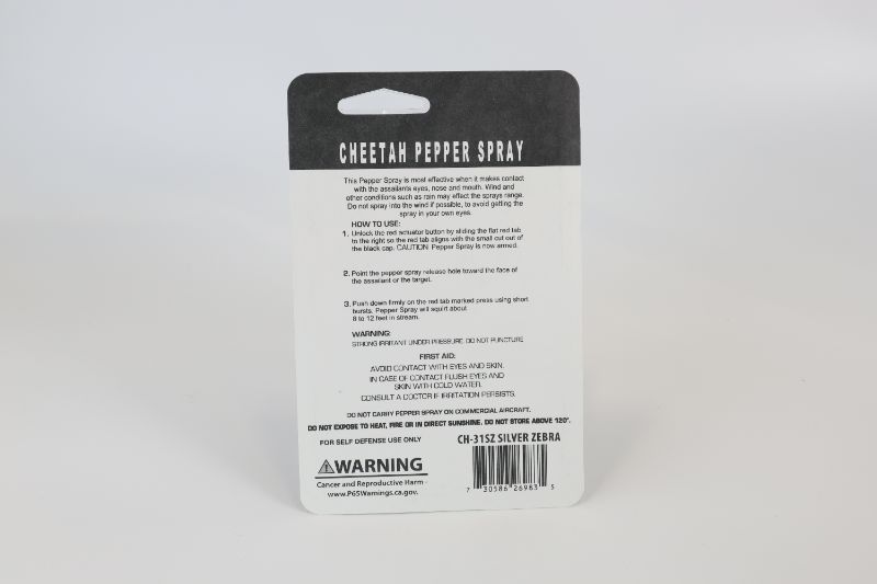 Photo 2 of CHEETAH BRAND PEPPER SPRAY WITH ZEBRA CARRYING CASE MAXIMUM STRENGTH 