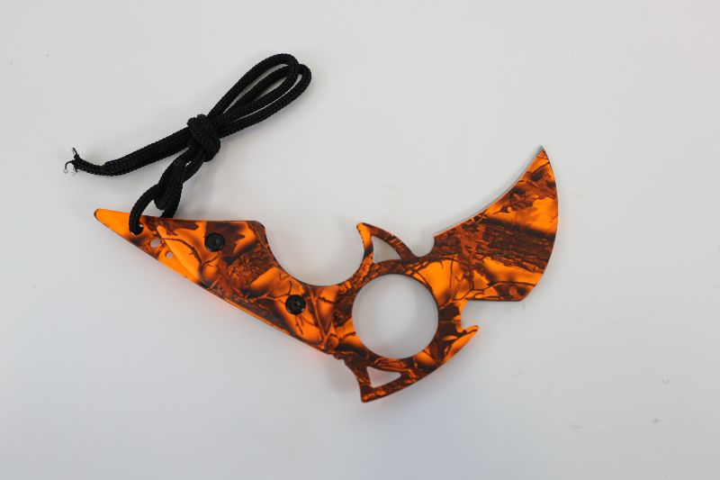 Photo 1 of ORANGE CAMO CLAW KNIFE NEW 