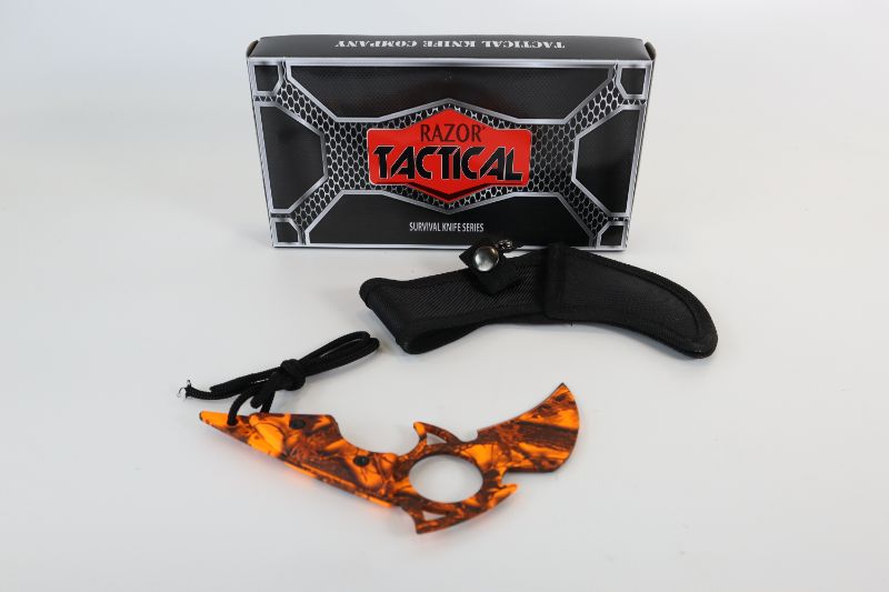 Photo 2 of ORANGE CAMO CLAW KNIFE NEW 