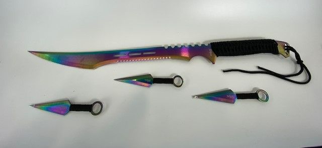 Photo 1 of RAINBOW THROWING KNIVES WITH SWORD NEW 