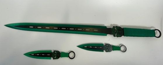 Photo 1 of GREEN SKULL SWORD WITH THROWING KNIVES NEW 