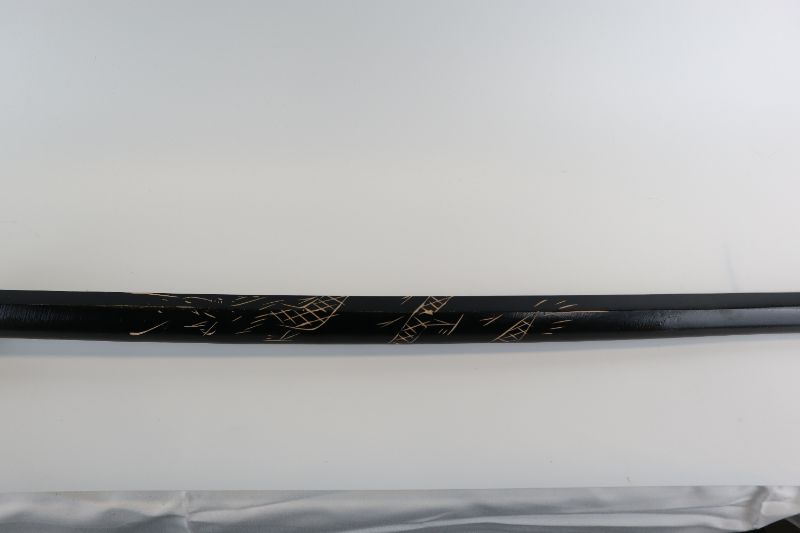 Photo 2 of BLACK WITH GOLD MARKINGS KID SWORD NEW 