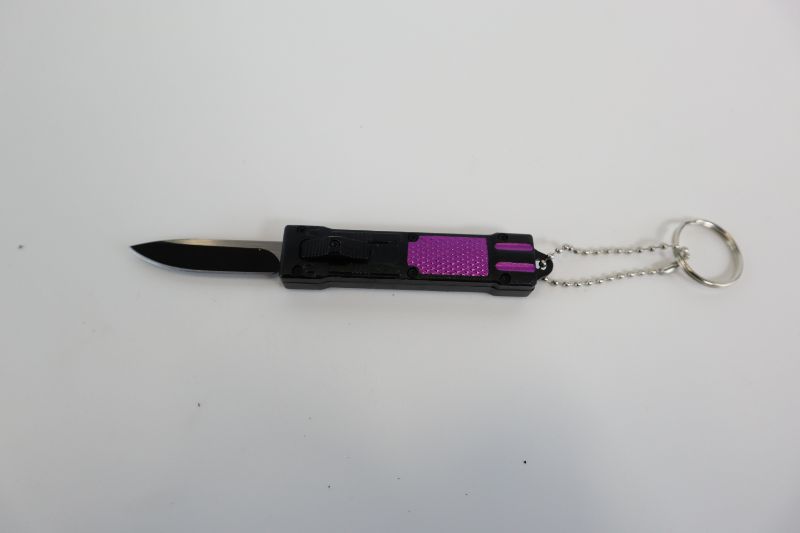 Photo 1 of PURPLE POCKET KNIVE WITH KEYCHAIN NEW