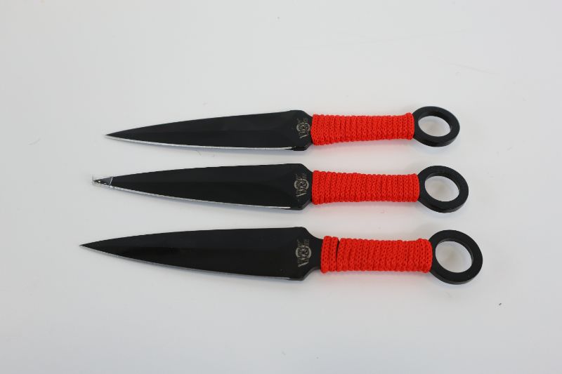 Photo 1 of RED 7.5 INCH THROWING KNIVES NEW 