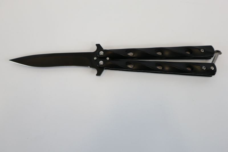 Photo 1 of BLACK AND SILVER BUTTERFLY KNIFE NEW 