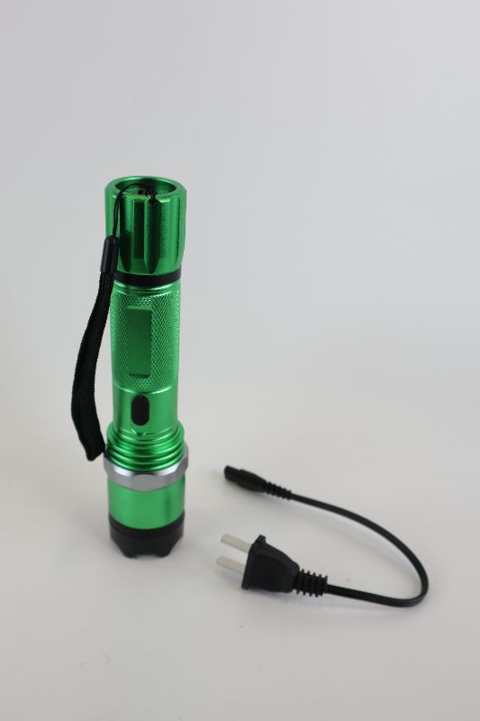 Photo 1 of GREEN AND BLACK TASER FLASHLIGHT COMBO NEW 