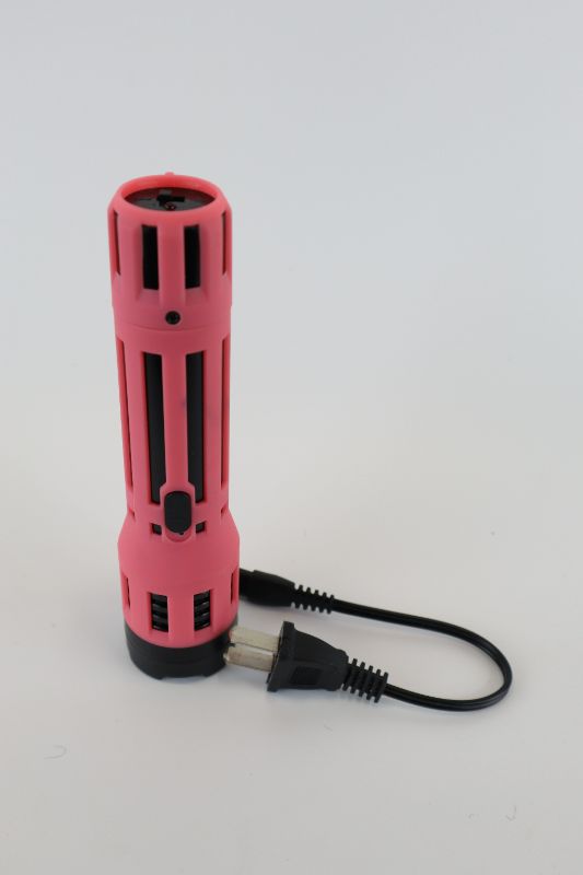 Photo 1 of PINK AND BLACK FLASHLIGHT TASER NEW 