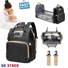 Photo 1 of Diaper bag waterproof with folding crib taykyo large multi functional bag with stroller straps 