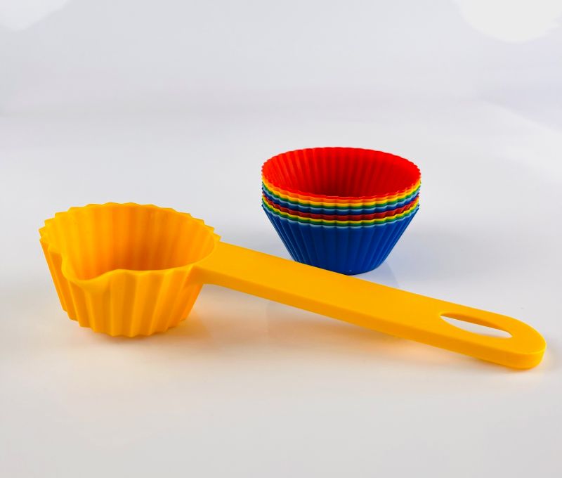 Photo 1 of  6 PACKS OF SILICONE MUFFIN LINERS AND A MUFFIN MEASURING CUP NEW $24.99