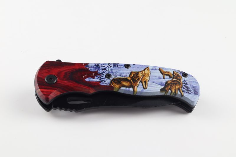 Photo 2 of WOLVES IN SNOW POCKET KNIFE NEW