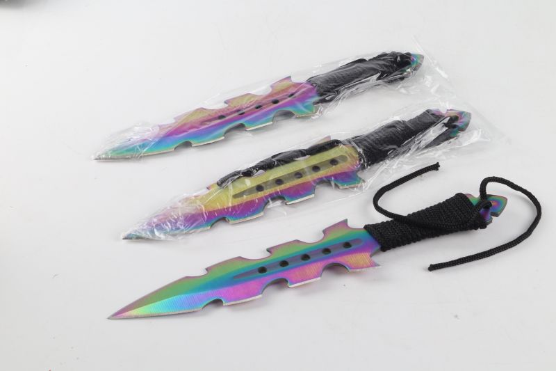 Photo 1 of 3 SET OIL SLICK THROWING KNIVES NEW