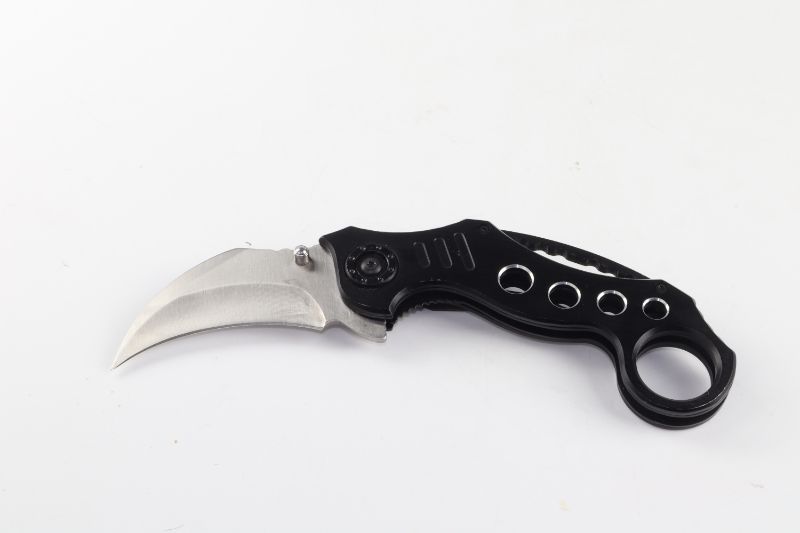 Photo 1 of RAPTOR CLAW POCKET KNIFE NEW 